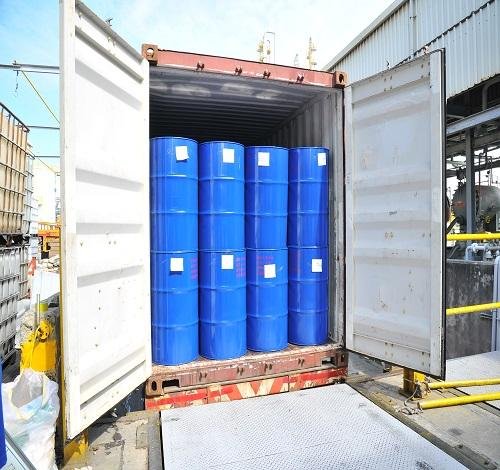 Chemical drums loaded into a shipping container for export